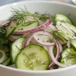 Classic cucumber salad with dill and red onion