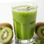 Fresh kiwi juice recipe served in a glass with mint and ice