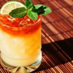 Perfect Mai Tai recipe cocktail with rum float, lime, and mint garnish
