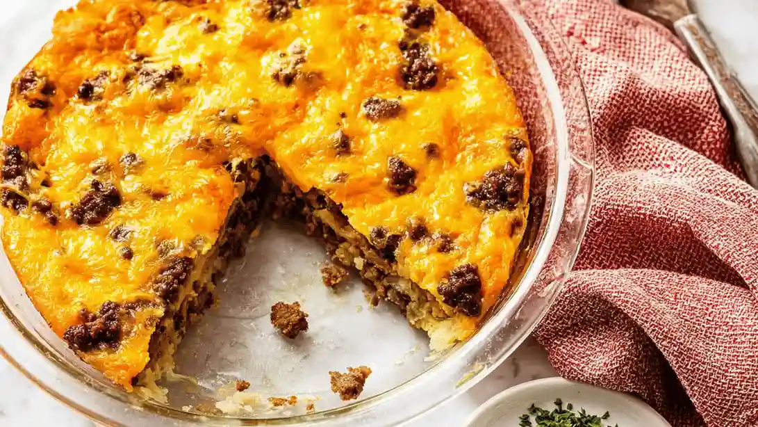 Cheesy cheeseburger pie casserole topped with melted cheddar and ground beef
